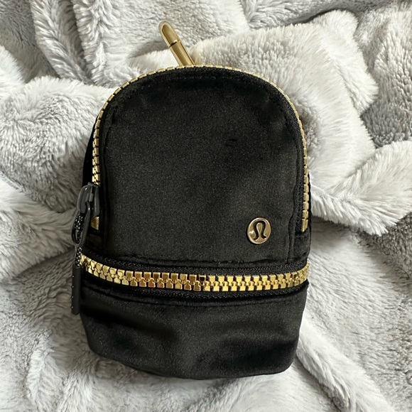 lululemon athletica Handbags - Lululemon City Adventurer Nano Backpack Black Velvet and Gold NWOT